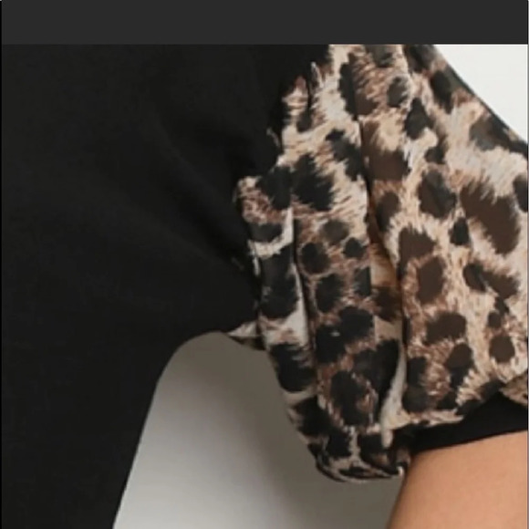 Black top with leopard sleeves new without tags. - Picture 4 of 7